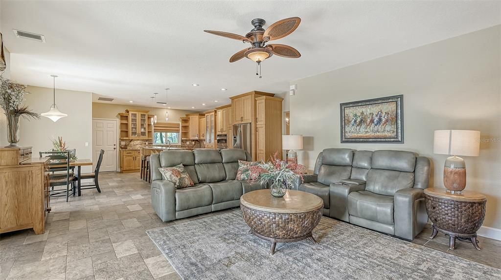 The Family Room is open to the beautifully remodeled kitchen.