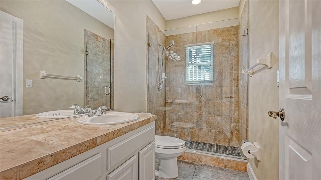 1st Floor Bathroom- This is the pool bath and it has been completely remodeled!  It is also next door to bedroom #2.