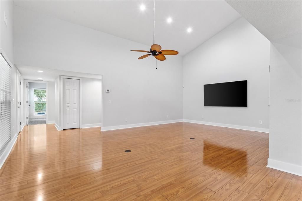 Living Room w wooden floor and power outlets in floor