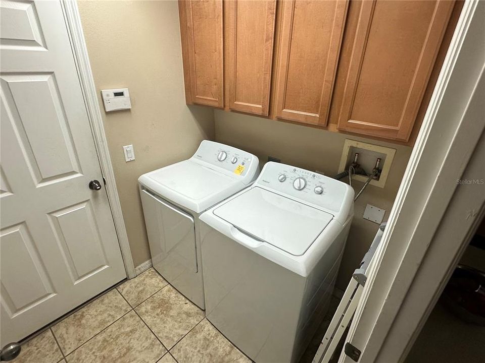 Laundry Room next to Garage Entrance