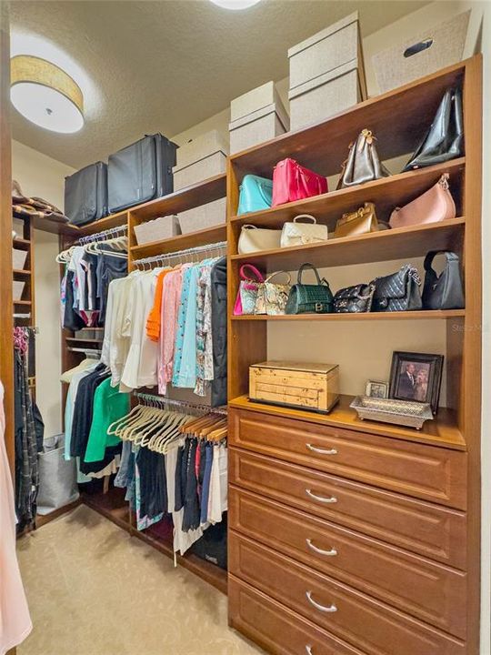 One of two huge walk in closets with built ins!