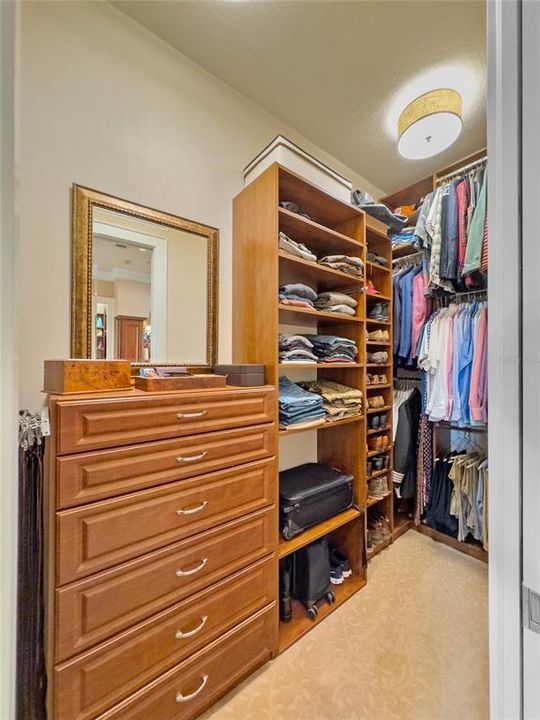 Another walk in Primary Suite closet with built ins (and optional safe)