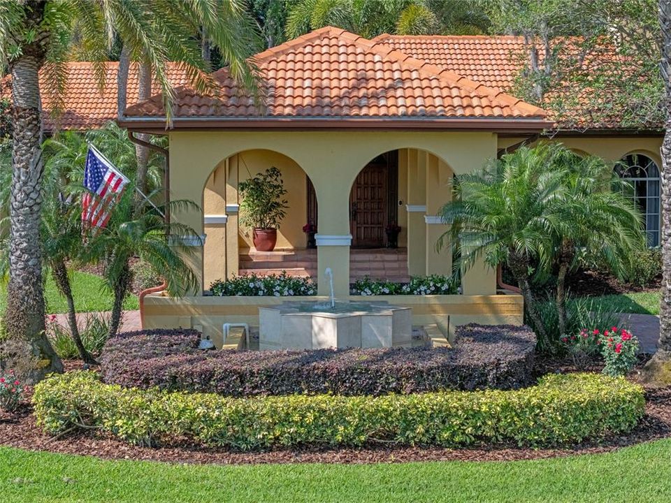 Your guests are greeted with manicured lawn, porte corchere, and resort style fountain!