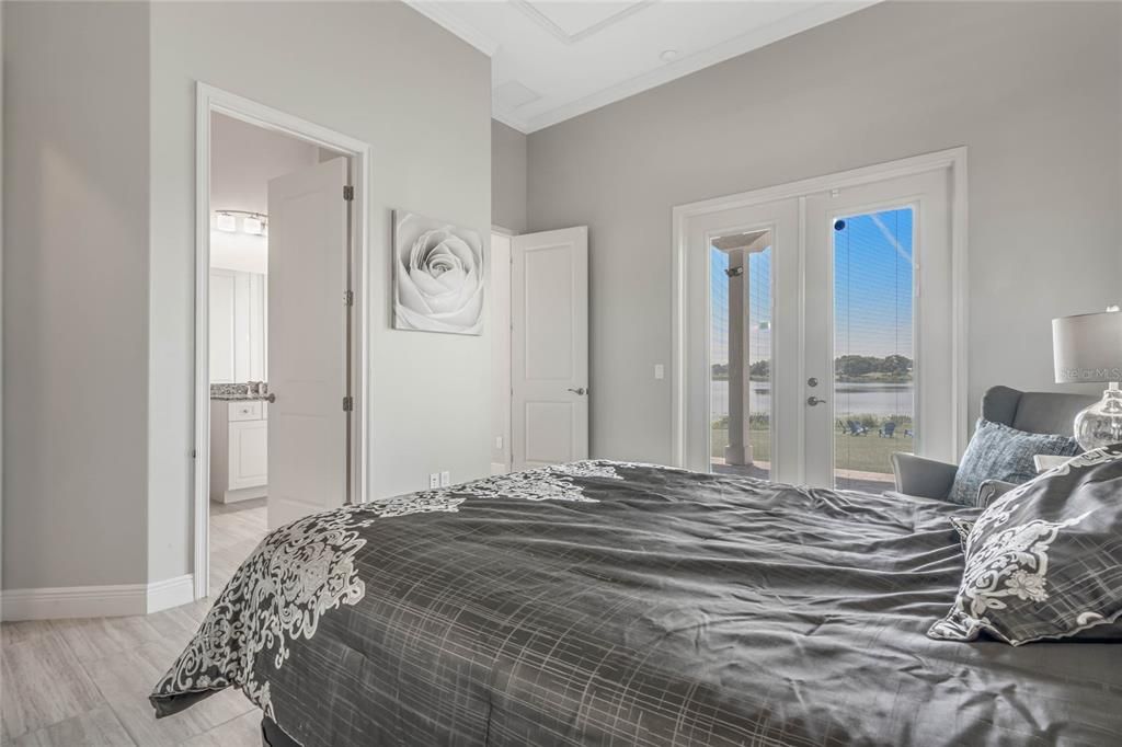 Guest Bedroom #2 (main floor) with views of Lake Owen and private patio
