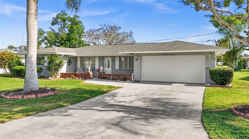 It has a two car garage and well maintained landscaping.