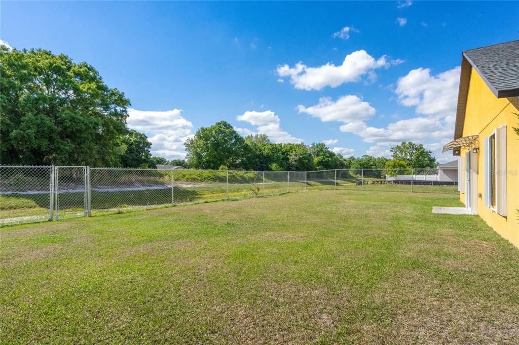 The expansive backyard is FULLY FENCED and backs up to a CONSERVATION AREA for the perfect blank canvas to create the backyard of your dreams!
