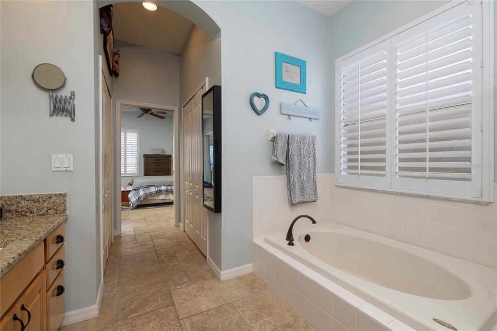 Soaking tub and separate walk in shower in the primary Bathroom