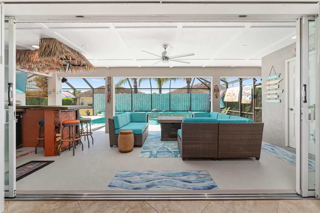 Stackable Sliding Doors to Pool View, Tiki Bar View, and Coffered Lanai Ceiling