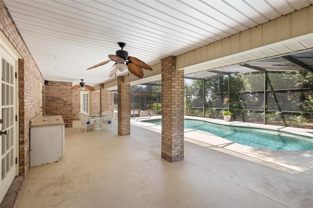 Covered patio with access to outside shower and guest bathroom