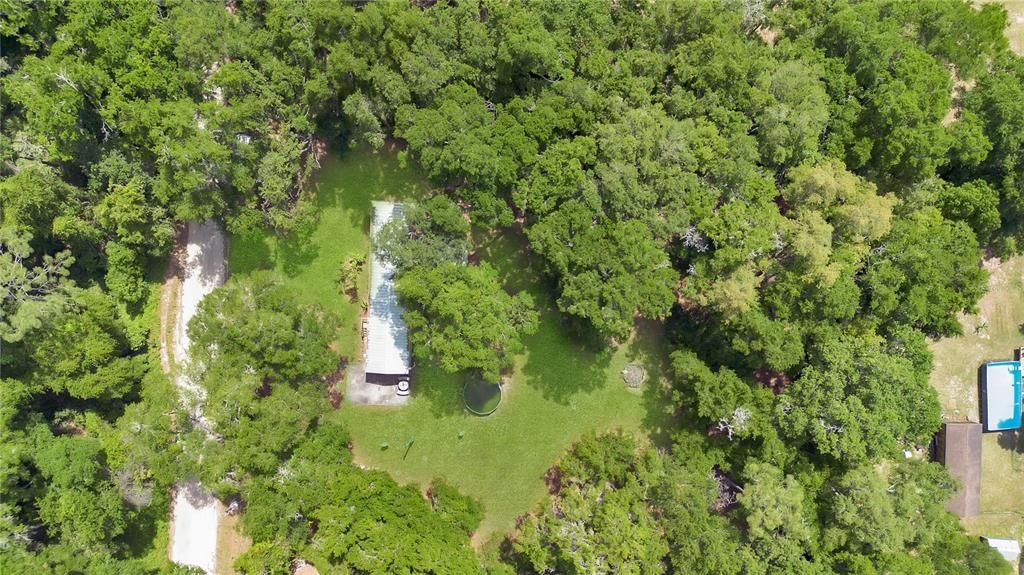 Aerial view of this 0.63 acre property.