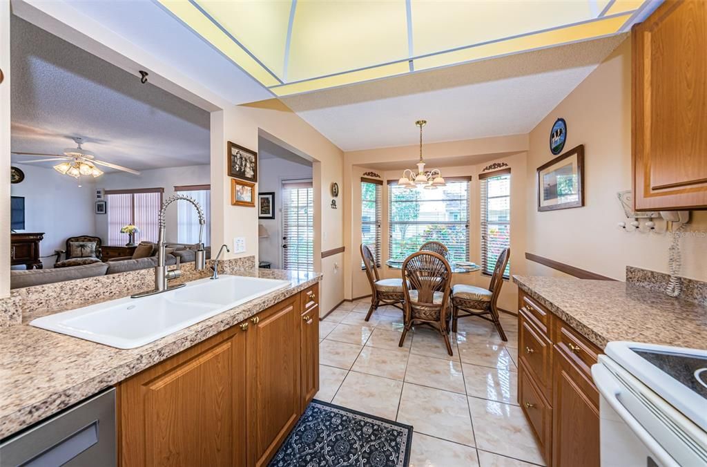 Breakfast nook area in kitchen to enjoy daily meals and nice wall openings for everyday living and spaciousness.