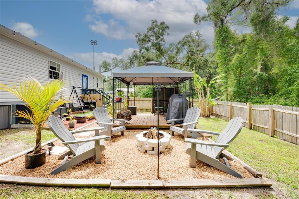 Outdoor entertaining oasis! Pergola and Fire Pit.