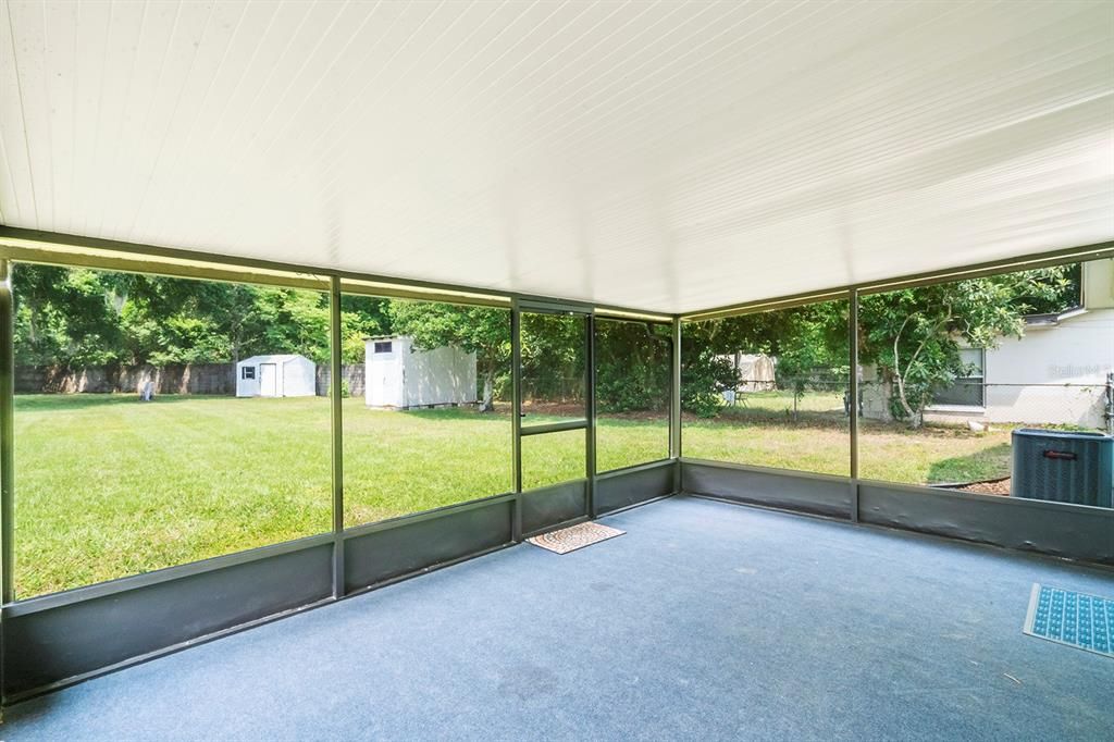 Screened-in and covered back porch overlooks your luscious backyard with two sheds. Plenty of room to add a pool! This home sits on .32 of an acre. Backyard is completely fenced with no rear neighbors.