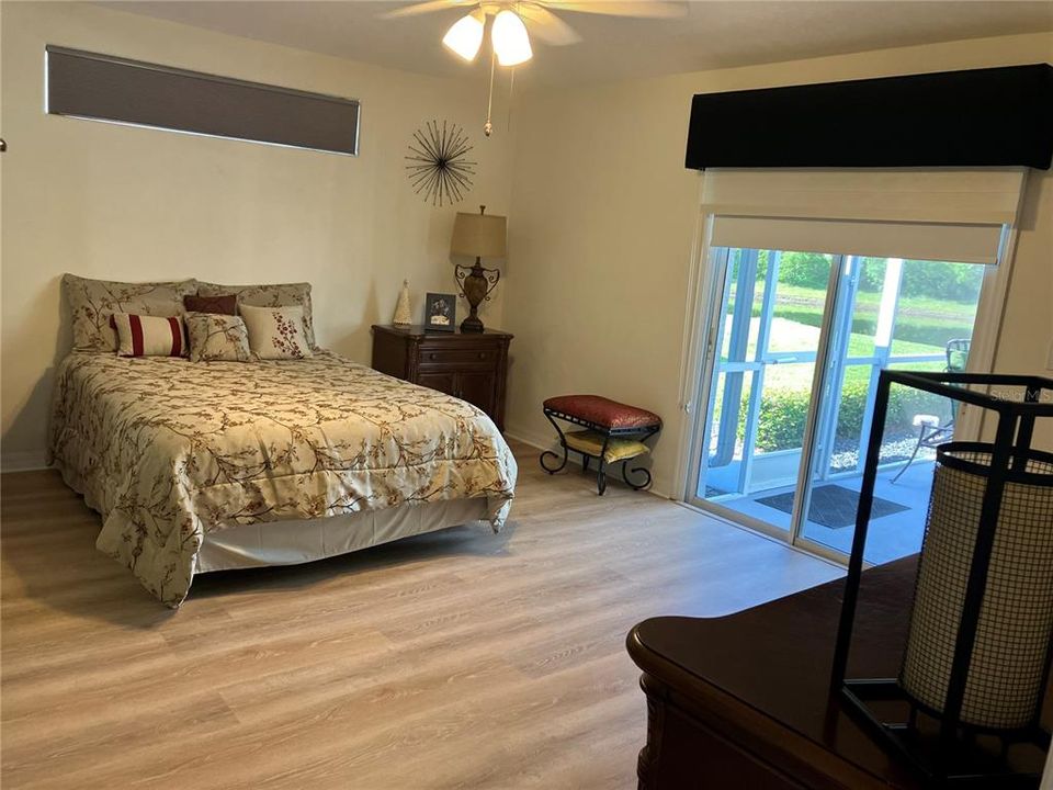 Master bedroom with direct access to pool areas