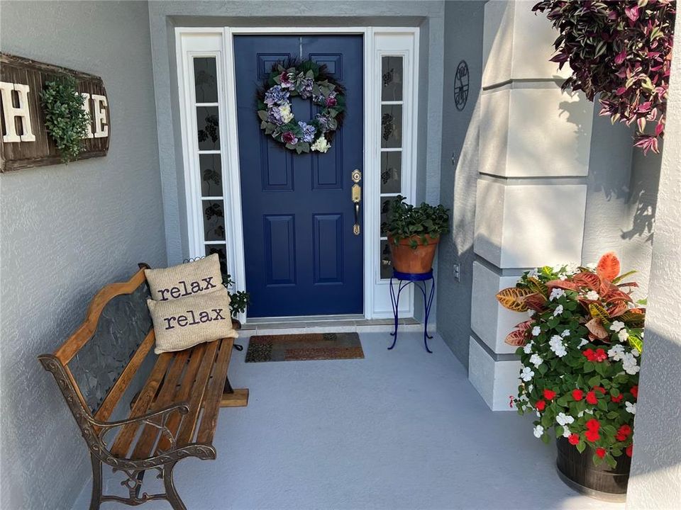 Welcoming entrance with covered porch