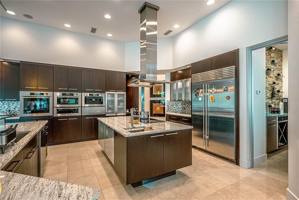 KITCHEN with SUB ZERO FRIDGE and entry to WINE ROOM