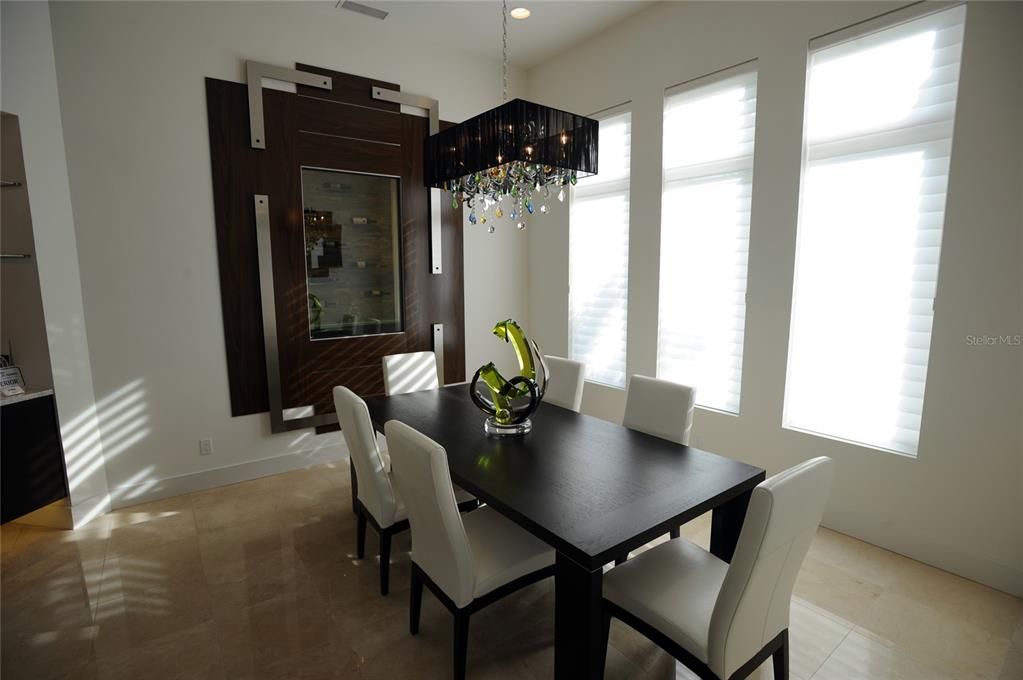 DINING ROOM with view into WINE CELLAR