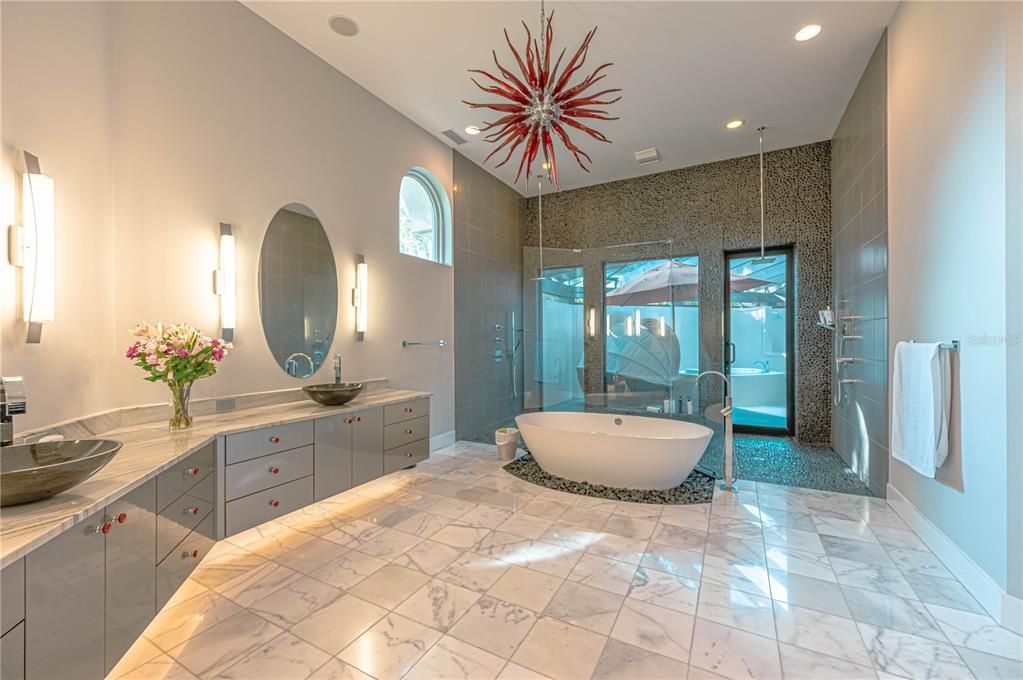 MASTER BATH with WALK IN SHOWER and door leading out to PRIVATE JACUZZI