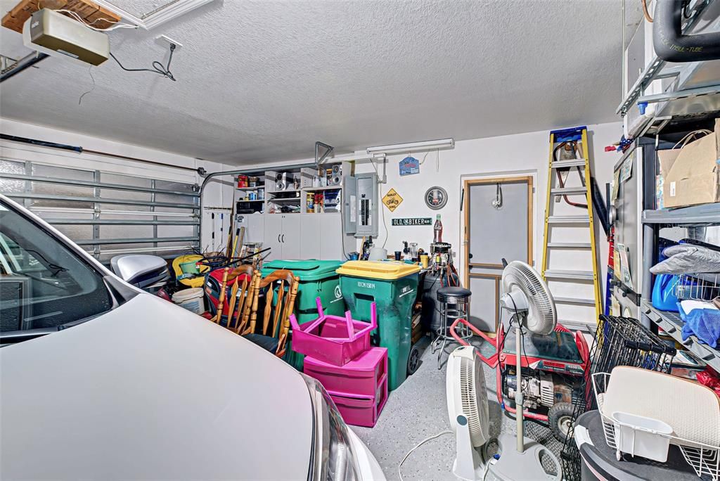 Enclosed garage - room for a car and storage.
