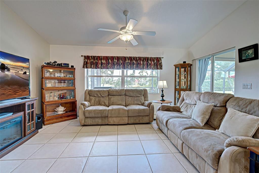 The family room also has a sliding door out to the lanai and can accommodate large furniture.