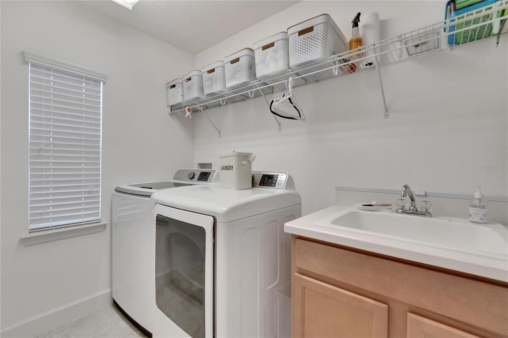 Upstairs bathroom with separate toilet closet at 12306 Terracina Chase Ct, Tampa, FL 33625