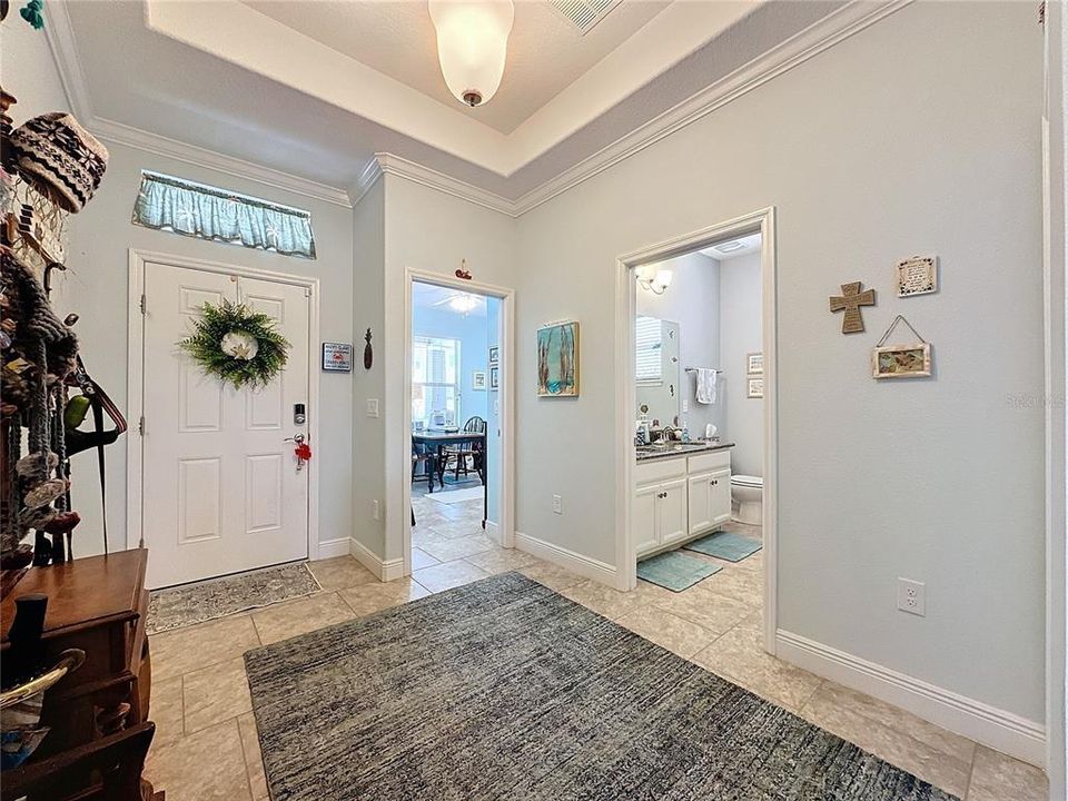 Foyer looking into Bedroom/Office and Guest Bathroom