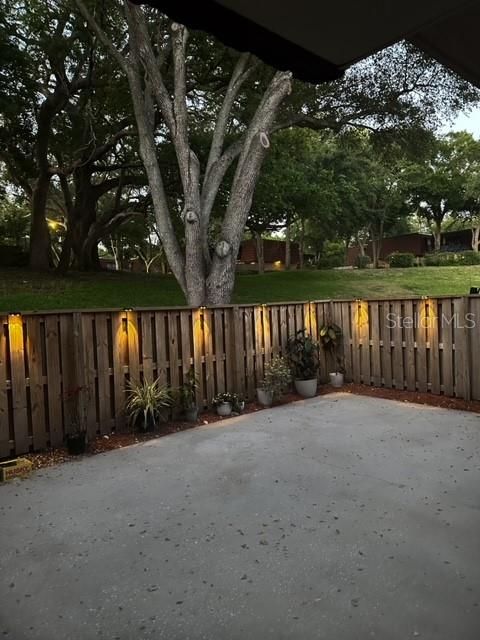 Spacious fenced front yard  with solar lights