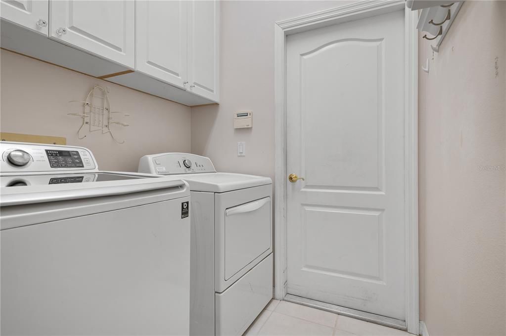 Utility room. Washer and dryer stay
