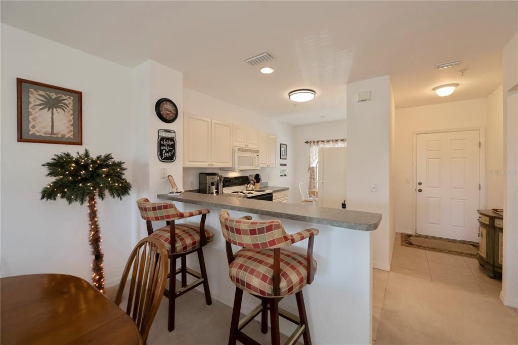 Breakfast bar kitchen and foyer entry