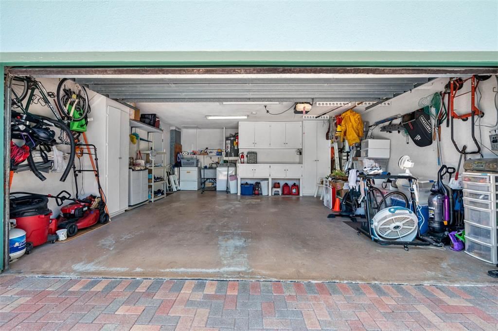 Two-car garage with hurricane impact door.