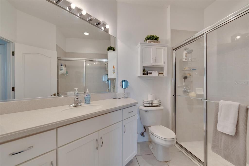 Primary bathroom with tall vanity