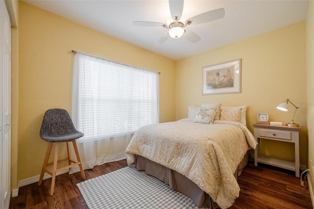 Guest bedroom is comfortable for a queen size bed.
