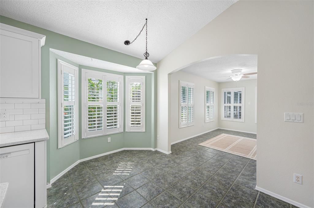 Eat-in kitchen space with bay window