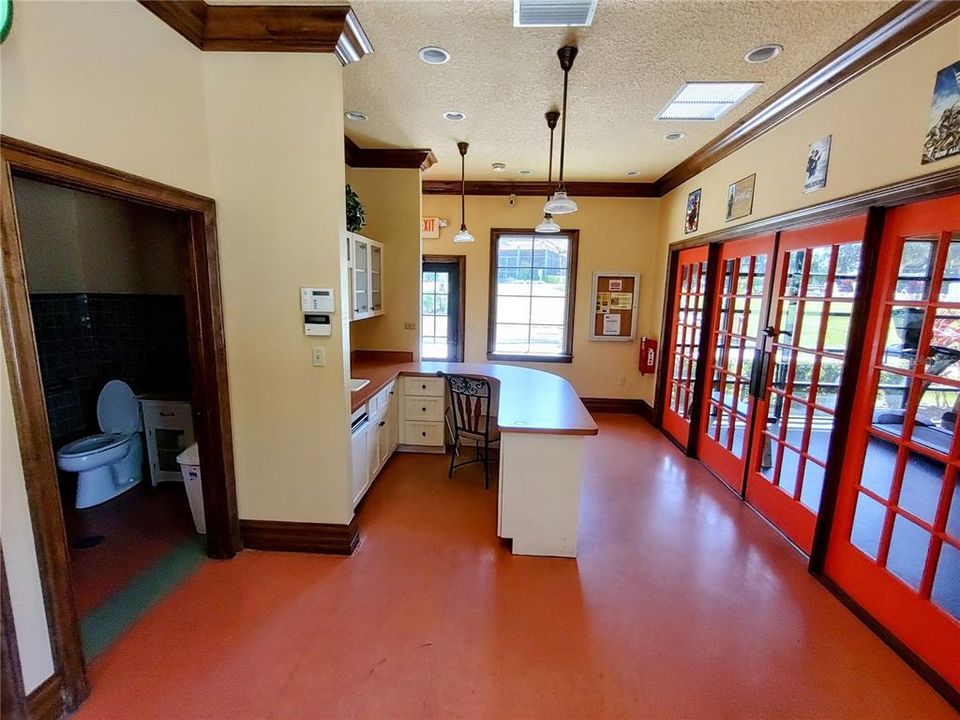 Community Center kitchenette with fitness center to the right
