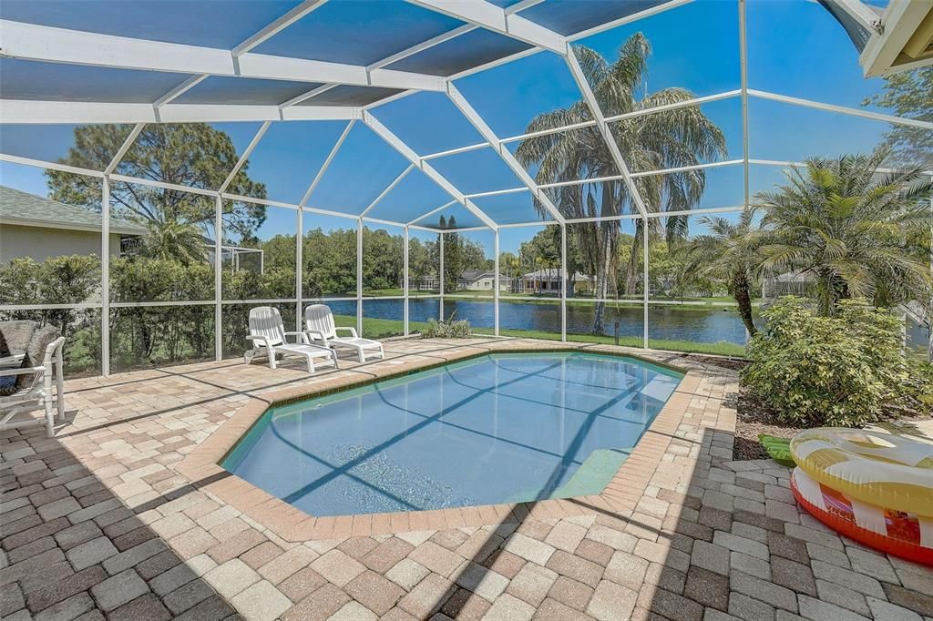 Solar heated pool and relaxing views of pond