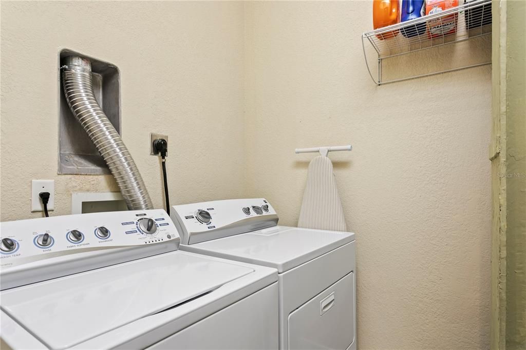 The laundry is located within the unit