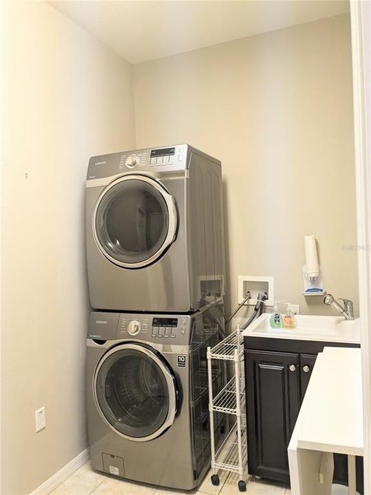 laundry room, appliances included and wet sink