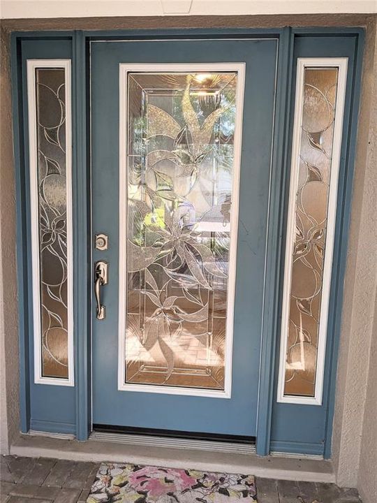 Beautiful Leaded front door with side panels
