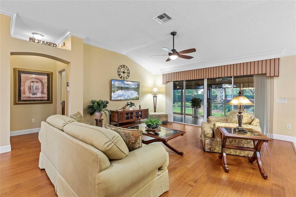 Glass sliding doors lead out to enclosed Lanai off Living room.