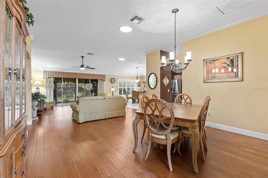 Beautiful hardwood floors grace the Foyer, Hallway, Dining and Living room. Crown molding throughout.