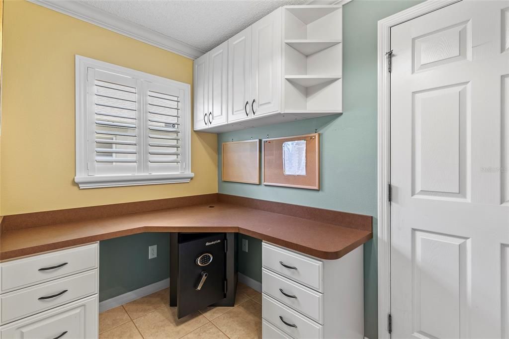 Laundry room with buil-in desk, Sentry safe.