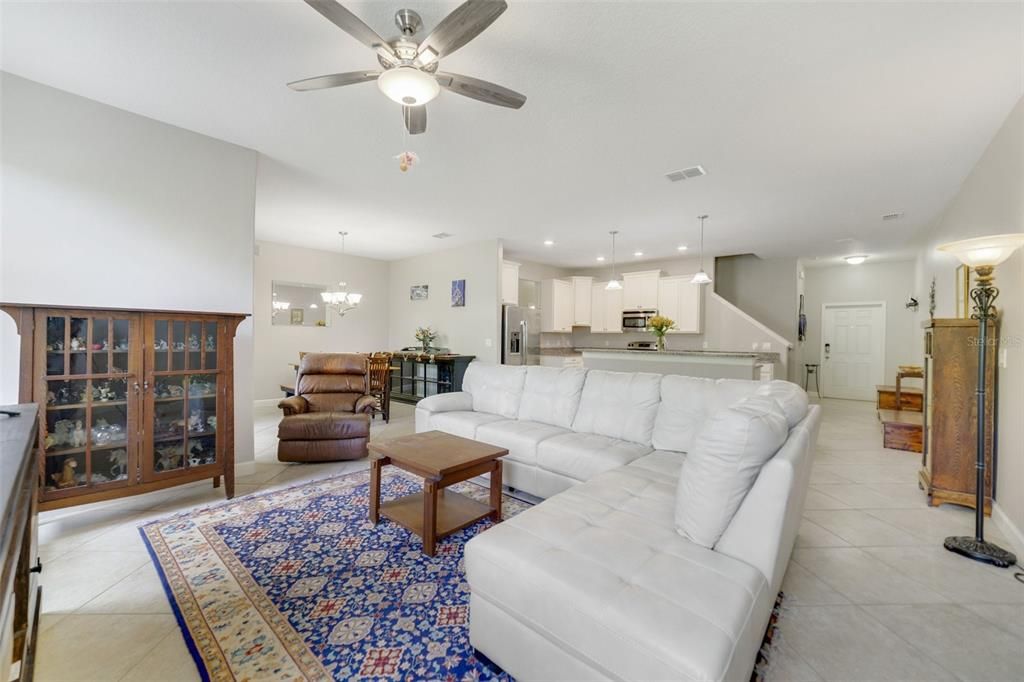 This bright OPEN CONCEPT delivers 3-bedrooms, 2.5-baths, LUXURY VINYL PLANK and OVERSIZED TILE FLOORS throughout, a BRAND NEW UPGRADED A/C (2023) and a bonus space in the FLEX/LOFT at the top of the stairs.