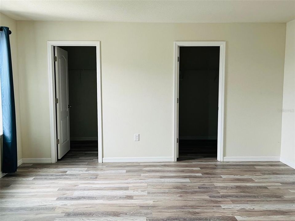 Master Bedroom with HIS and HERS walking Closets