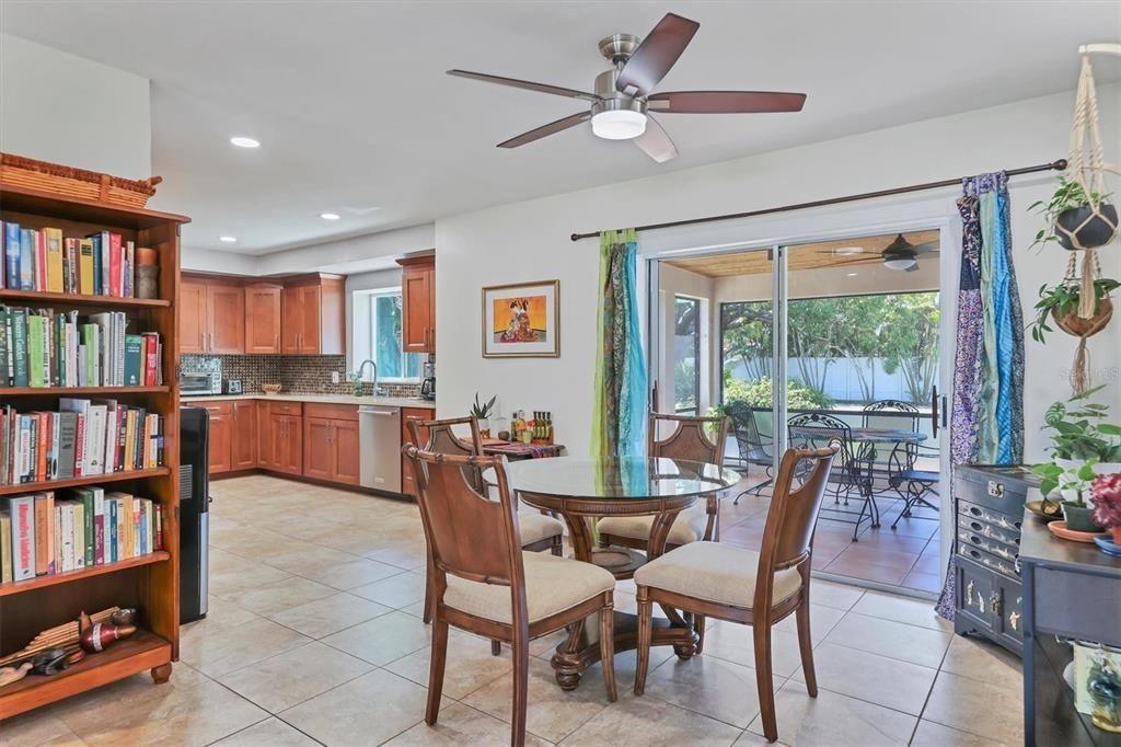 Dining Room/Sliding glass doors out to the Covered Screened in Lanai