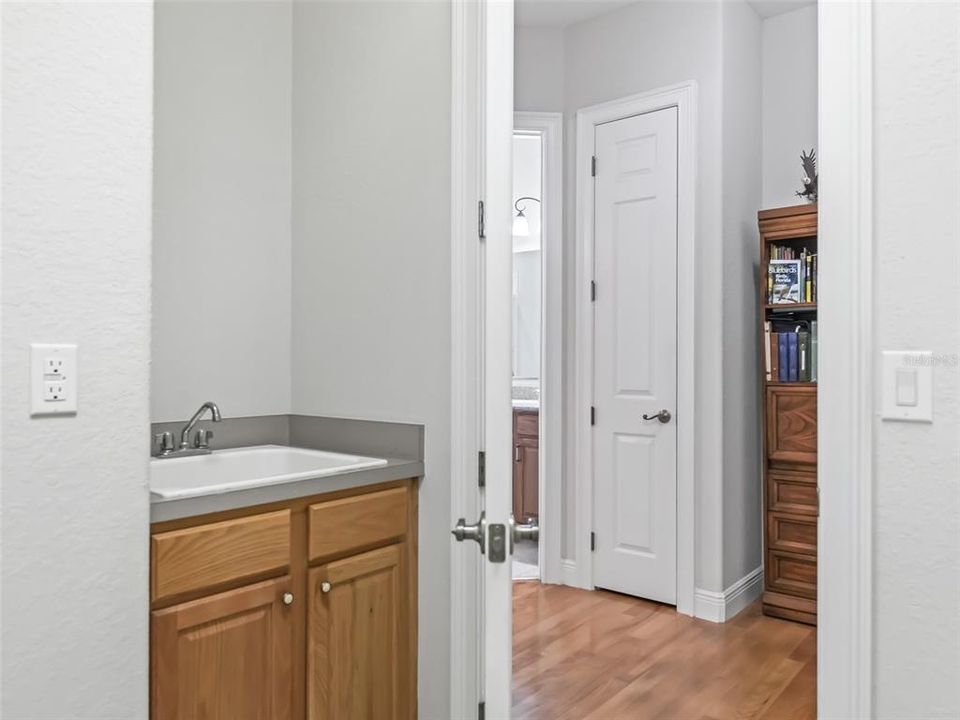Sink in Laundry room - also linen closet in hallway