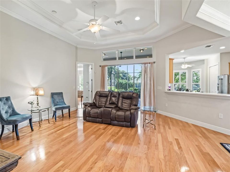 Great Room with wood floors and high ceilings