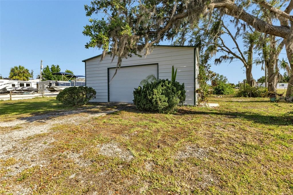 26X26 DETAGED GARAGE THAT IS POSITIONED ON OTHER END OF DOUBLE LOT.