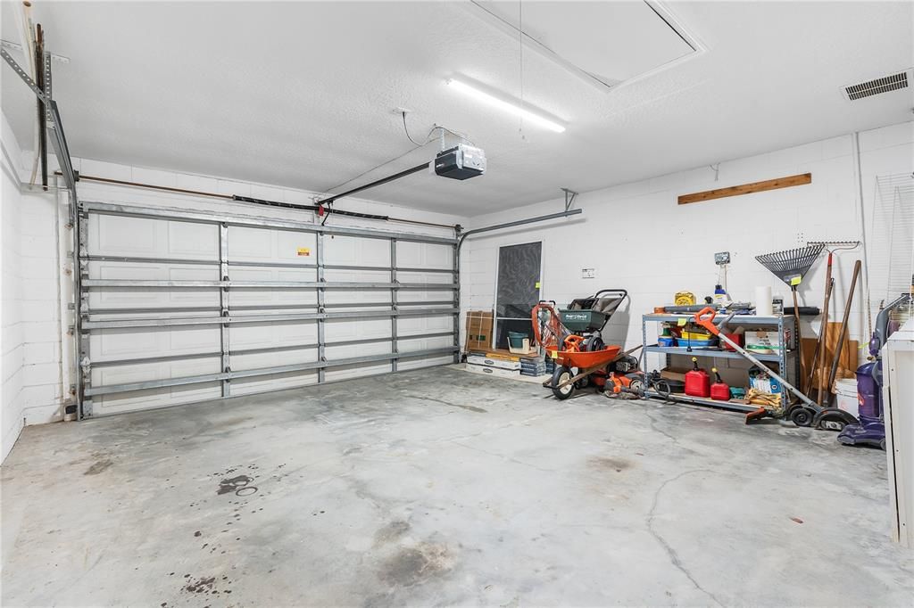 Garage with Lawn Equipment