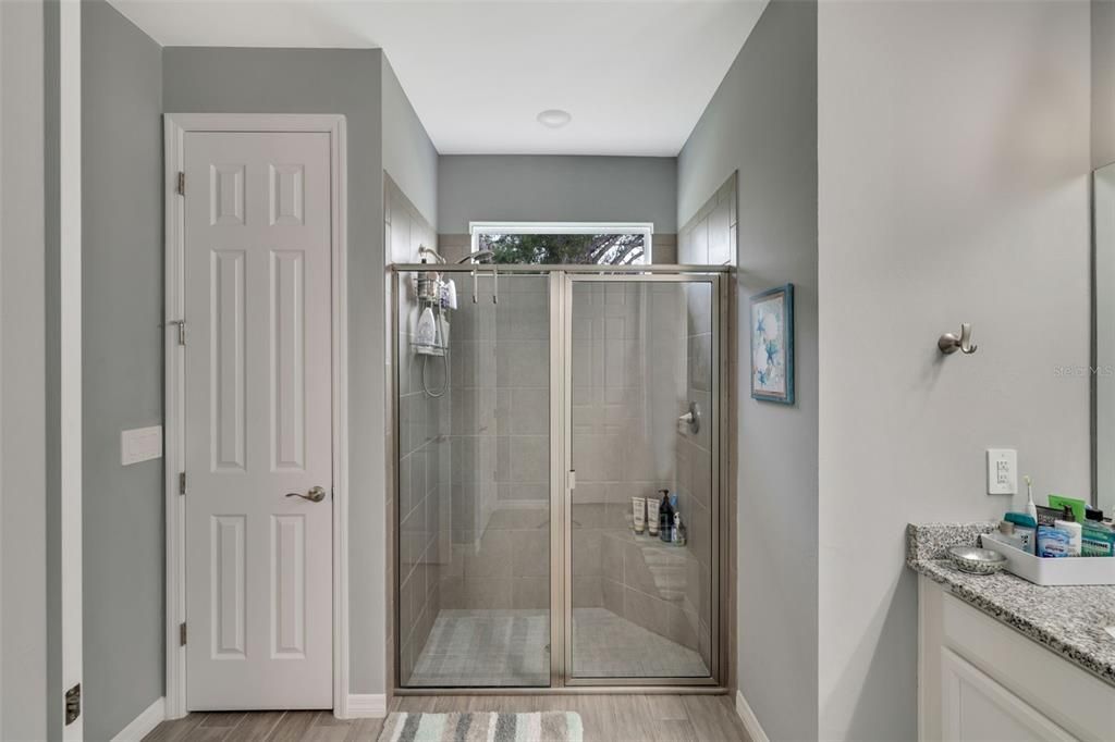 Primary bathroom offers walk in shower.