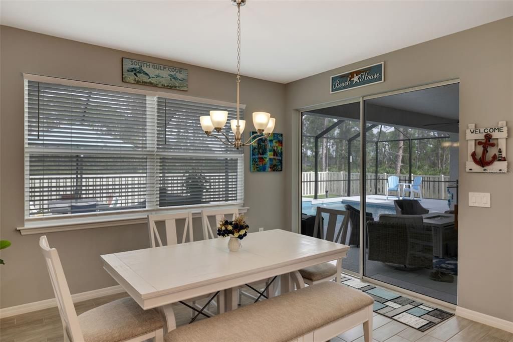 Dining area off the kitchen w/ 8 ft slider